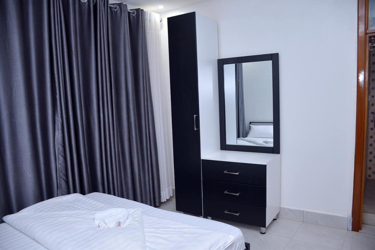Be Inn Hotel Кигали Экстерьер фото