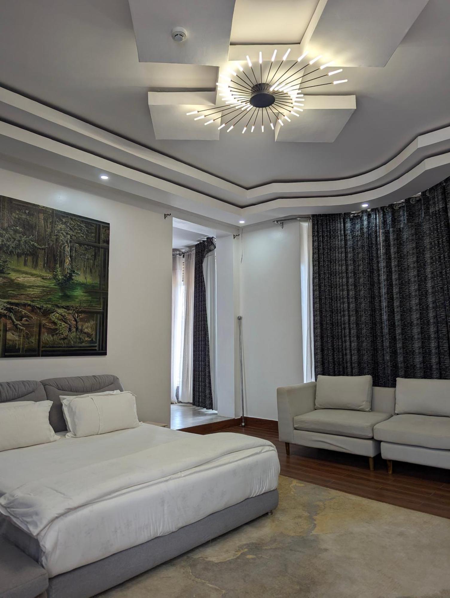 Be Inn Hotel Кигали Экстерьер фото